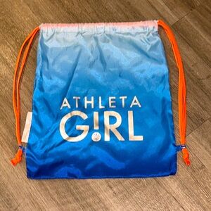 Athleta Girl Drawstring Bag Backpack. Blue bag, orange drawstrings. 15”x14”